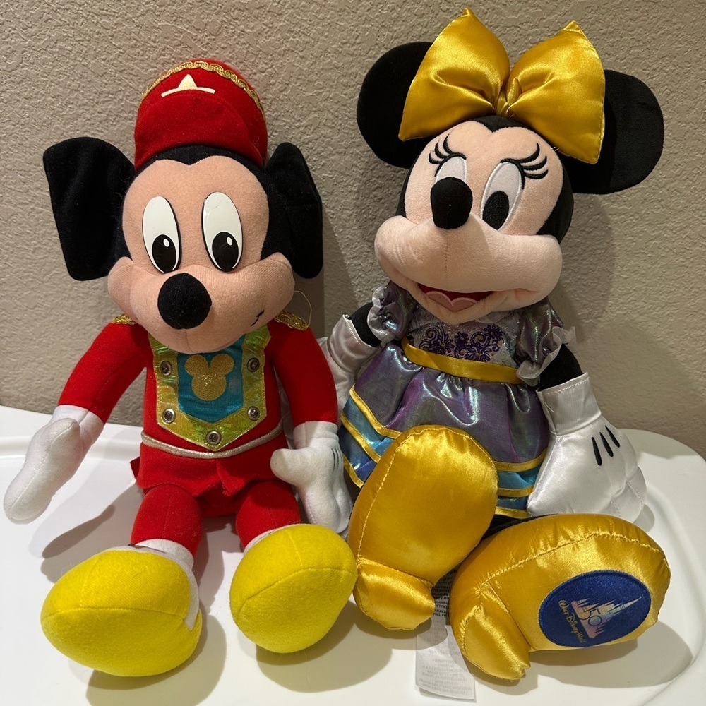 Vintage Mickey and 50th Minnie. Mickey lights up. see video. Minnie is stuffed.